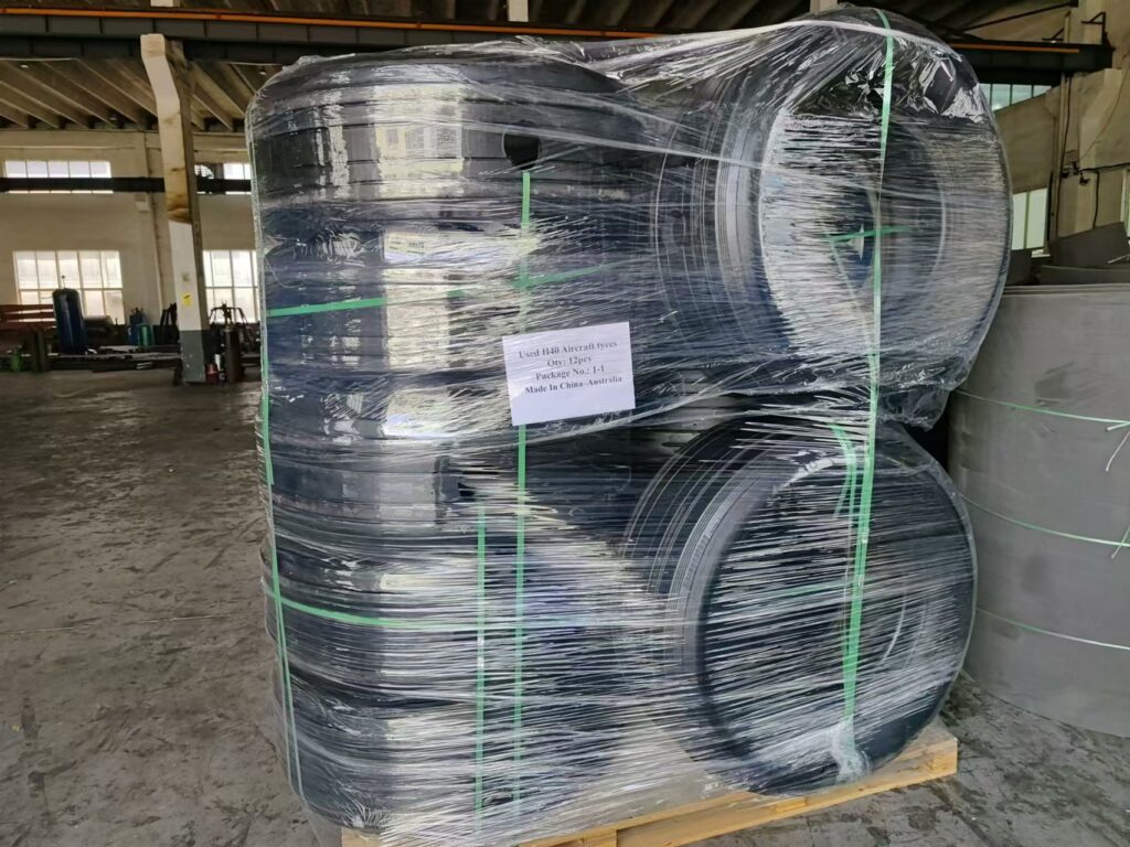 Wrapped aircraft tyres prepared for export delivery and pneumatic fender assembly