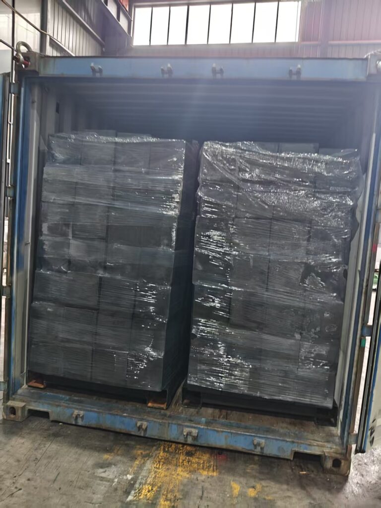 Custom square rubber fenders stacked for El Salvador shipment