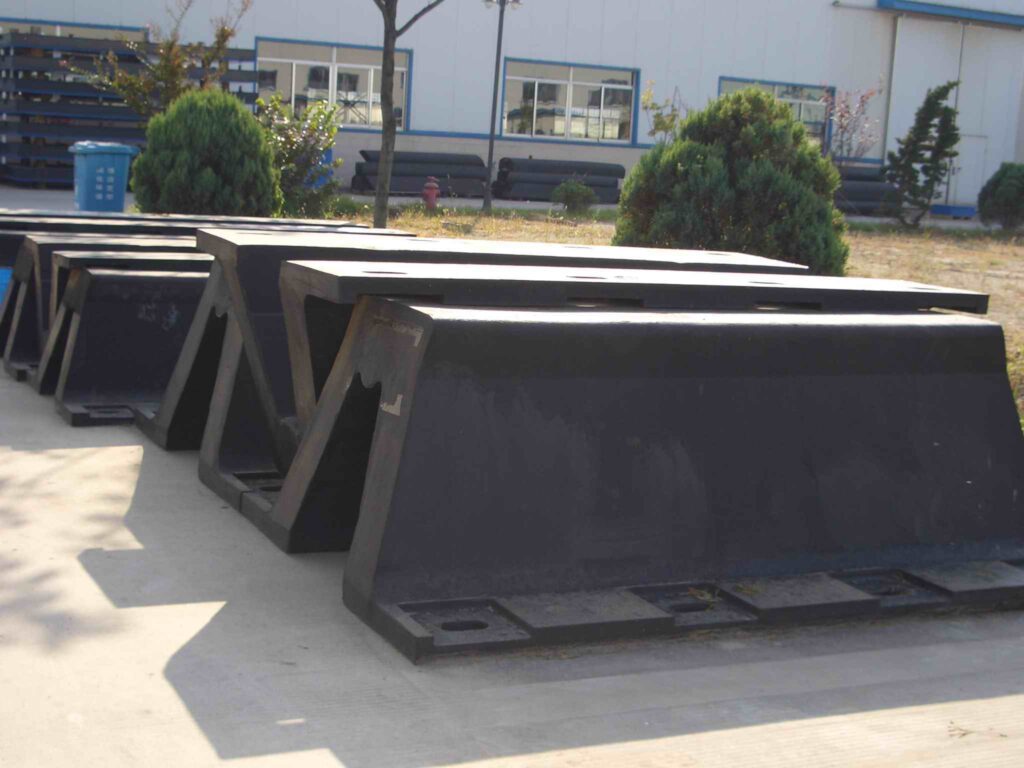Black Arch Rubber Fenders in Factory Yard