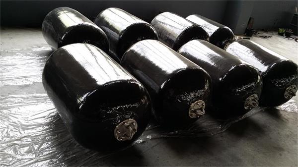 Black foam filled fenders with end fittings for boat and dock protection