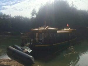 Boat supported by marine rubber airbags during launching operation