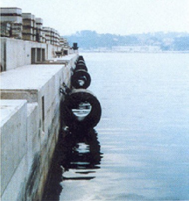 Cylindrical rubber fenders used for dock berthing protection with support structure