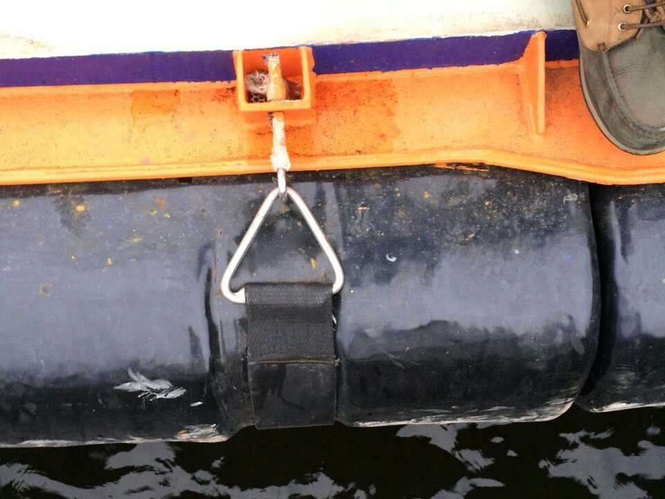 EVA boat fender mounting strap with metal triangle ring installed on boat side