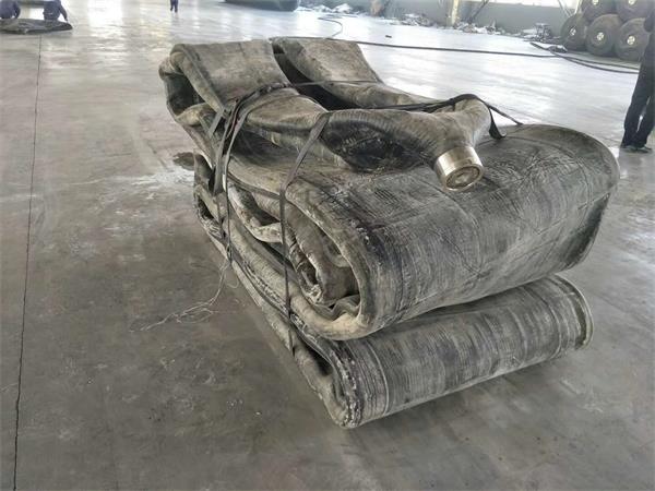 Folded ship launch airbag prepared for packing and delivery