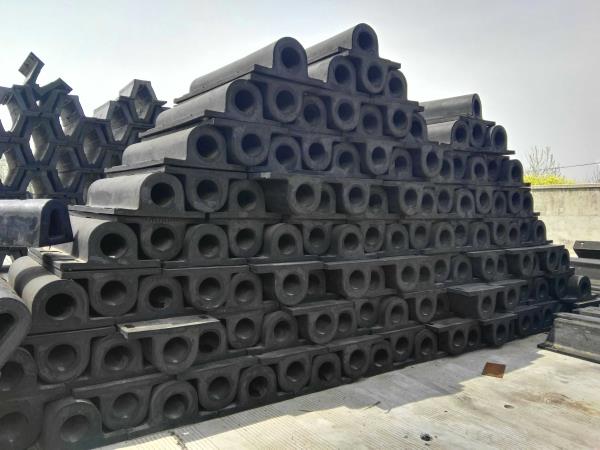 GD rubber fender standard profiles stacked in factory yard for dock and quay protection projects