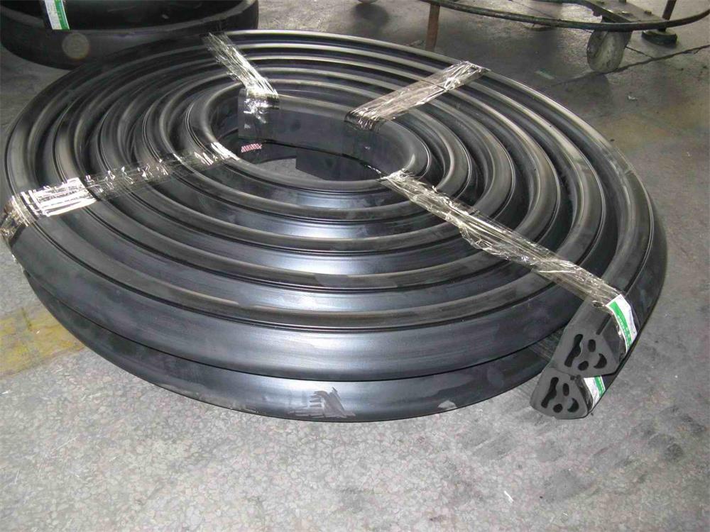Coiled marine rubber extrusion profile for sealing applications