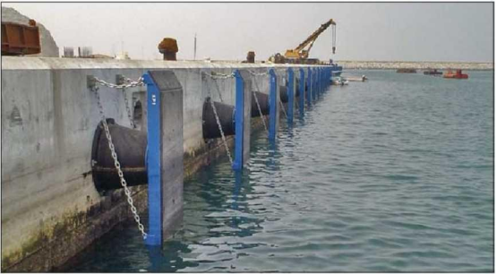 Rubber cone fender system installed on dock berth with frontal panel and chain accessories