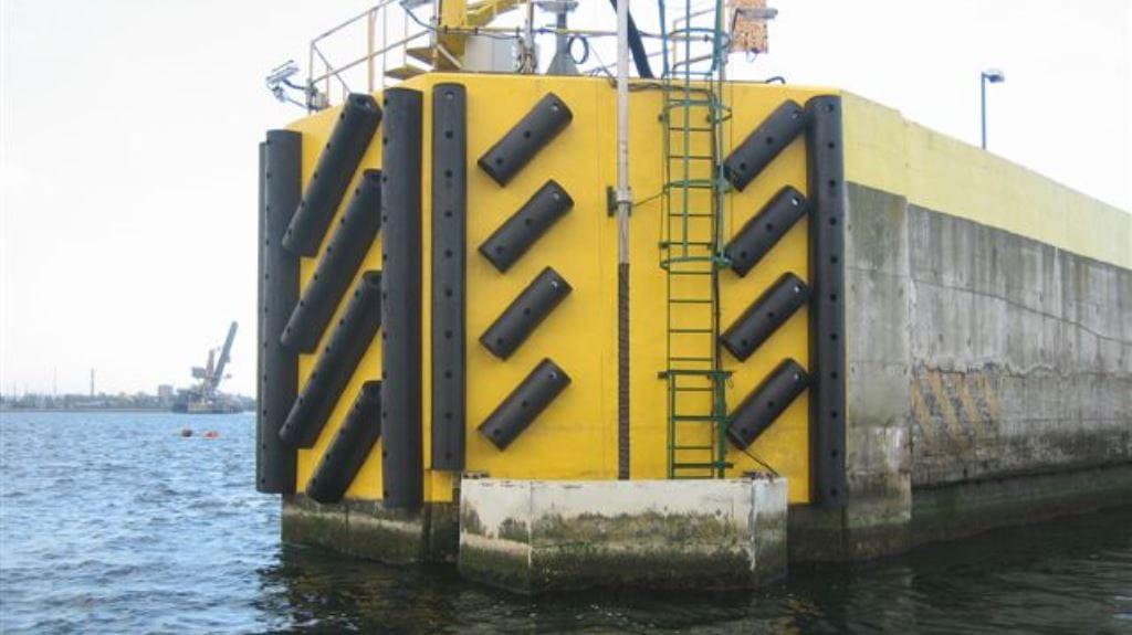 Rubber fender systems installed on a dock corner for berth protection