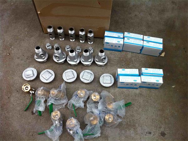 Inflation accessory kit for ship launch airbag including valves, fittings, and gauges