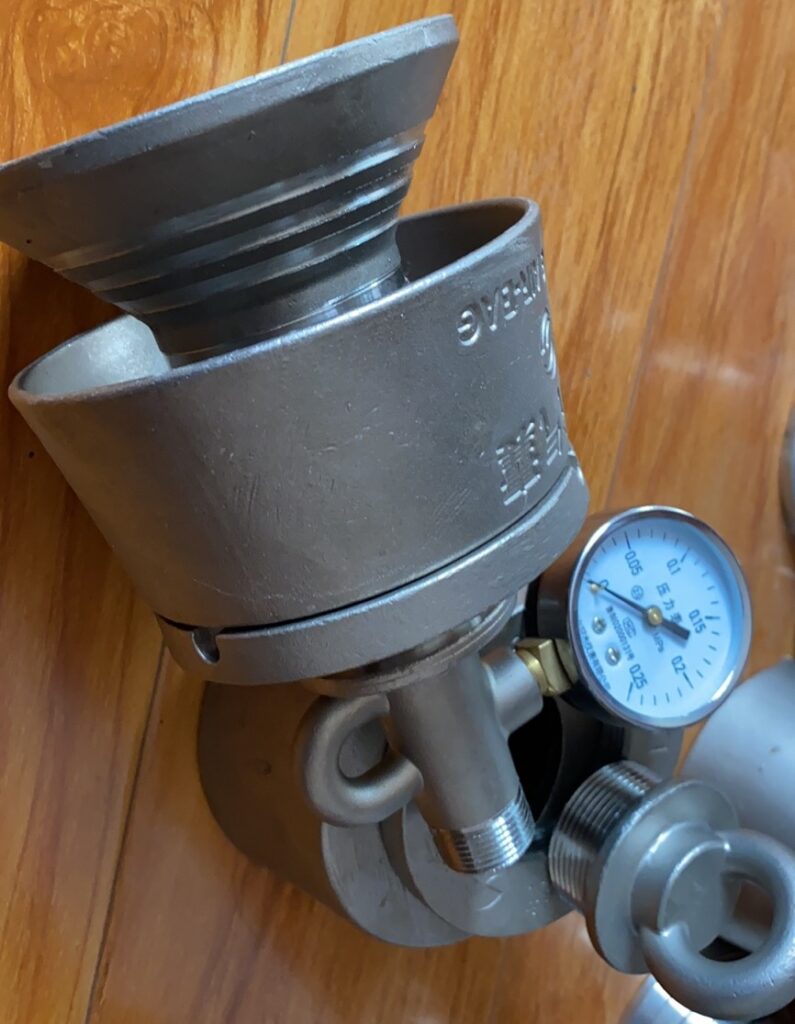 Valve assembly and pressure gauge used for ship launch airbag inflation and pressure control