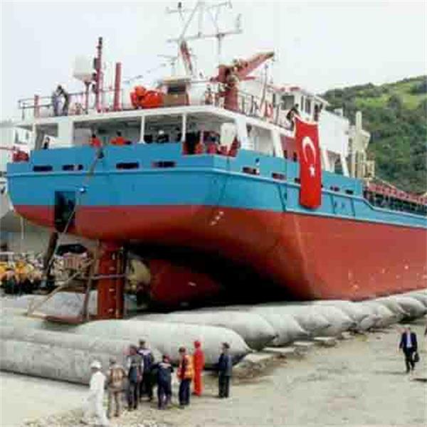 Ship launch airbags supporting a vessel during launching or dry docking operation