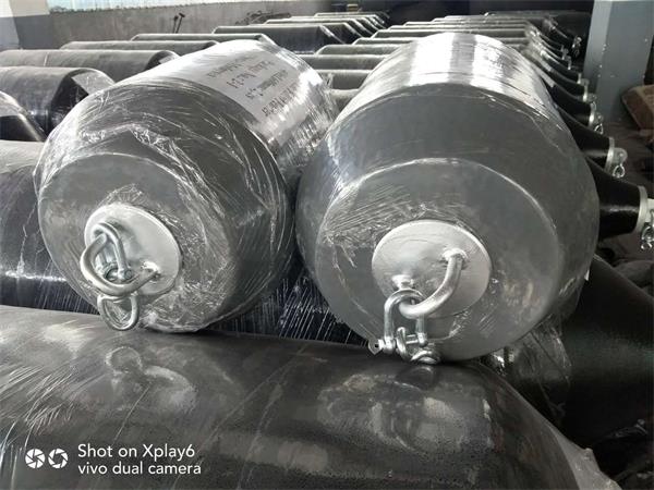 Small navy grey foam filled boat fenders with end fittings for marine and boat protection
