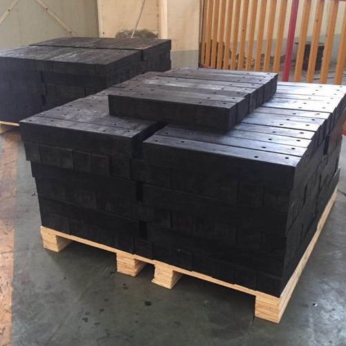 Square rubber fenders packed on wooden pallets for shipment
