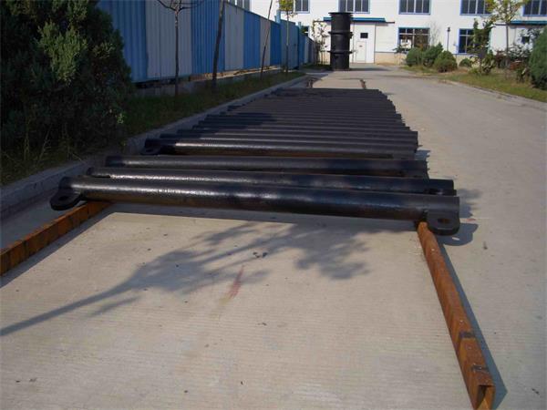 Steel support bars prepared for cylindrical rubber fender installation on docks and quay walls