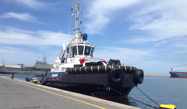 Tugboat fendering application with rubber fenders installed for bow and side protection