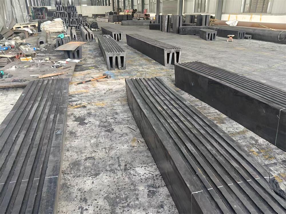 W rubber fenders arranged in factory before cutting and shipment