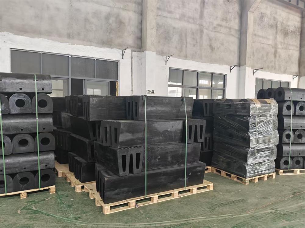 Cylindrical and D rubber fenders for custom tugboat fendering system