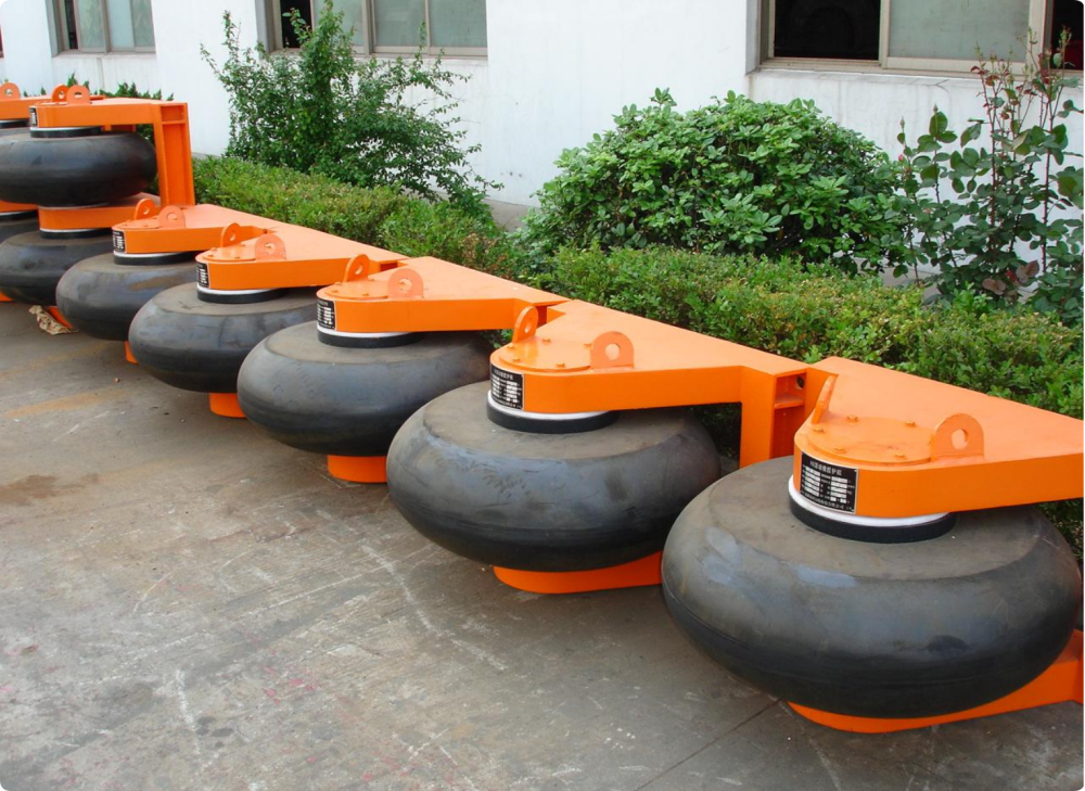 Dock wheel fender with orange steel frame for quay and berth protection
