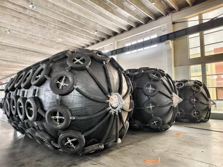 Pneumatic rubber fenders inflated for production testing before shipment