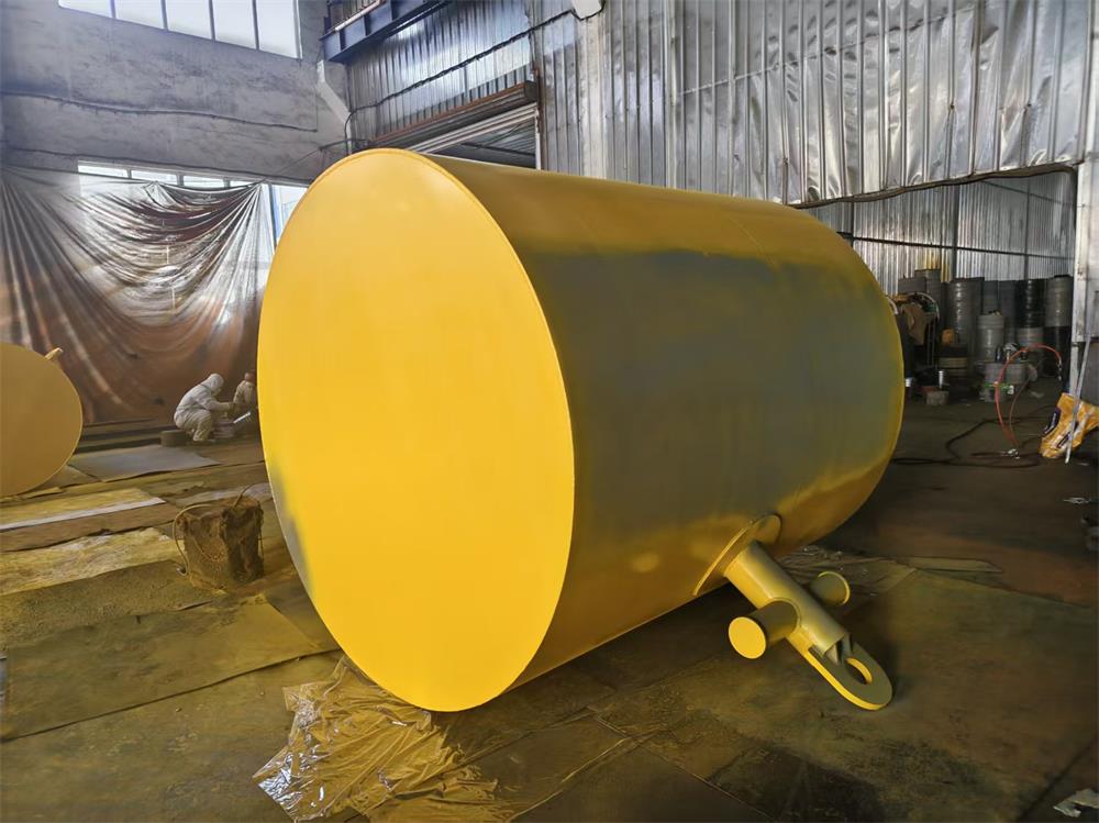Large custom steel mooring buoy during factory fabrication